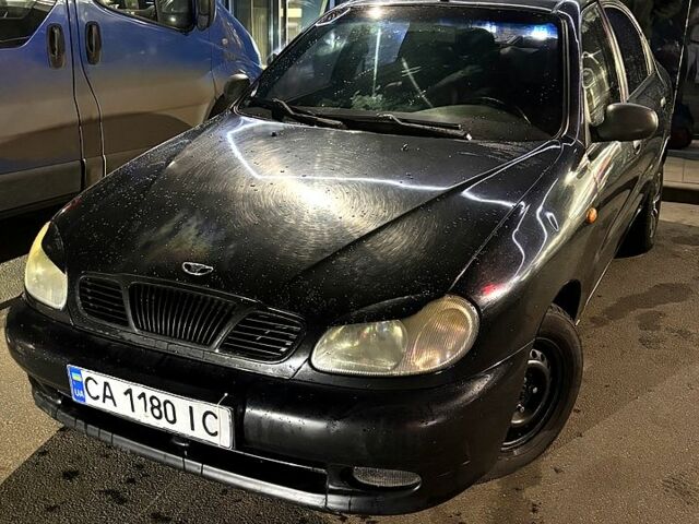 Черный Дэу Ланос, объемом двигателя 1.5 л и пробегом 292 тыс. км за 2300 $, фото 1 на Automoto.ua