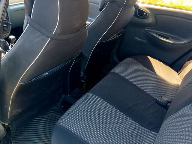 Черный Дэу Ланос, объемом двигателя 1.5 л и пробегом 240 тыс. км за 3300 $, фото 9 на Automoto.ua