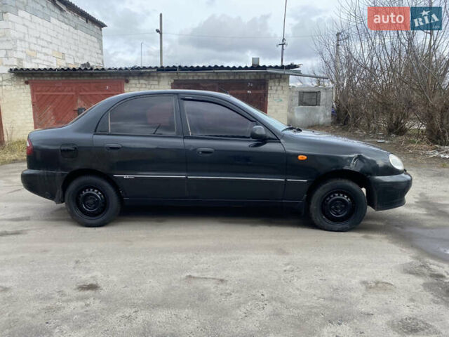 Чорний Деу Ланос, об'ємом двигуна 1.4 л та пробігом 180 тис. км за 1800 $, фото 2 на Automoto.ua