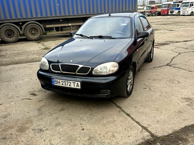 Черный Дэу Ланос, объемом двигателя 1.6 л и пробегом 287 тыс. км за 2400 $, фото 8 на Automoto.ua