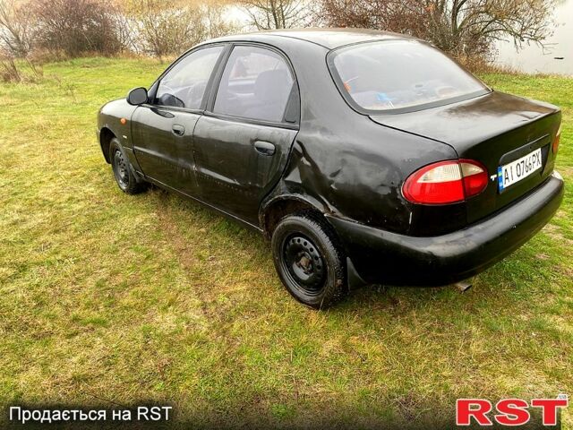 Чорний Деу Ланос, об'ємом двигуна 1.5 л та пробігом 256 тис. км за 1100 $, фото 2 на Automoto.ua