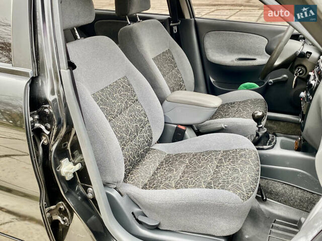 Чорний Деу Ланос, об'ємом двигуна 1.5 л та пробігом 198 тис. км за 2600 $, фото 25 на Automoto.ua