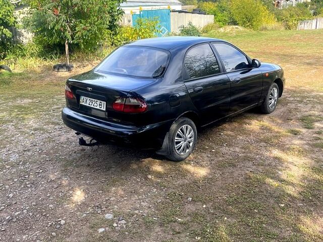 Чорний Деу Ланос, об'ємом двигуна 1.6 л та пробігом 158 тис. км за 1380 $, фото 3 на Automoto.ua