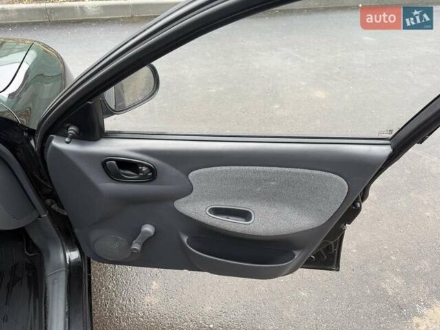 Черный Дэу Ланос, объемом двигателя 1.5 л и пробегом 128 тыс. км за 2999 $, фото 54 на Automoto.ua