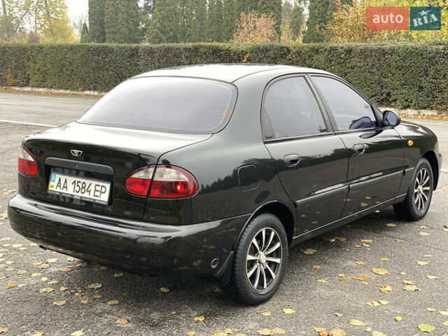 Черный Дэу Ланос, объемом двигателя 1.5 л и пробегом 156 тыс. км за 2750 $, фото 2 на Automoto.ua