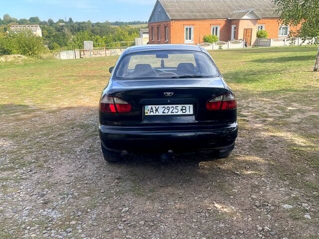 Чорний Деу Ланос, об'ємом двигуна 1.6 л та пробігом 158 тис. км за 1380 $, фото 4 на Automoto.ua