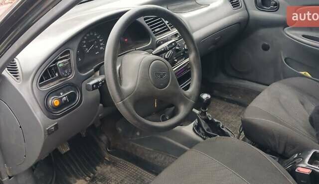 Чорний Деу Ланос, об'ємом двигуна 1.4 л та пробігом 180 тис. км за 1600 $, фото 2 на Automoto.ua