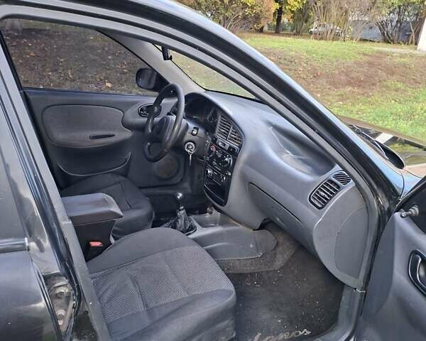 Чорний Деу Ланос, об'ємом двигуна 1.5 л та пробігом 219 тис. км за 1900 $, фото 7 на Automoto.ua