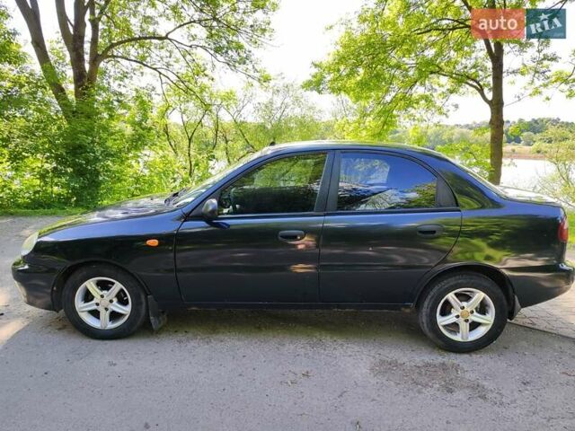 Черный Дэу Ланос, объемом двигателя 1.4 л и пробегом 165 тыс. км за 1450 $, фото 3 на Automoto.ua