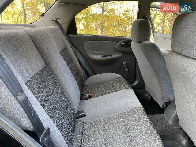 Дэу Ланос 2008 в Кривом Роге на Automoto.ua Черный Дэу Ланос, объемом двигателя 1.5 л и пробегом 105 тыс. км за 2700 $, фото 10 на Automoto.ua