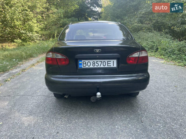 Чорний Деу Ланос, об'ємом двигуна 1.5 л та пробігом 157 тис. км за 2350 $, фото 1 на Automoto.ua