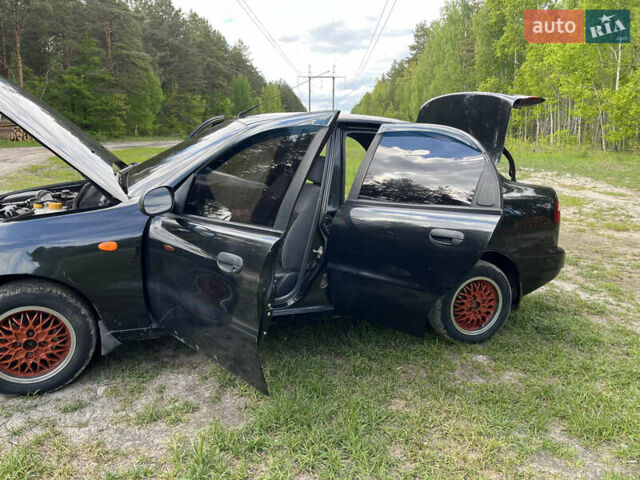 Чорний Деу Ланос, об'ємом двигуна 1.5 л та пробігом 189 тис. км за 2200 $, фото 16 на Automoto.ua