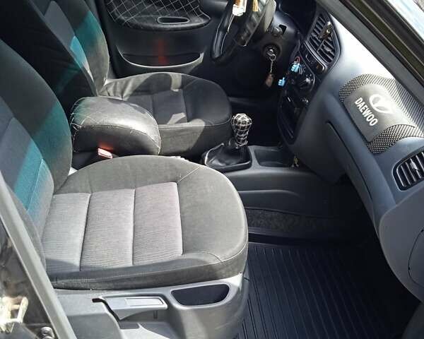 Черный Дэу Ланос, объемом двигателя 1.5 л и пробегом 170 тыс. км за 2850 $, фото 14 на Automoto.ua