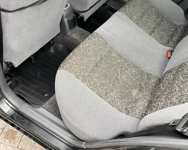 Черный Дэу Ланос, объемом двигателя 1.5 л и пробегом 130 тыс. км за 2300 $, фото 10 на Automoto.ua