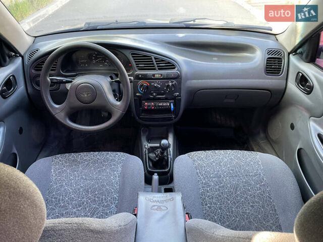 Черный Дэу Ланос, объемом двигателя 1.5 л и пробегом 234 тыс. км за 2400 $, фото 12 на Automoto.ua