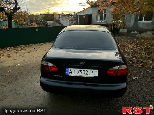Черный Дэу Ланос, объемом двигателя 1.4 л и пробегом 220 тыс. км за 1800 $, фото 12 на Automoto.ua