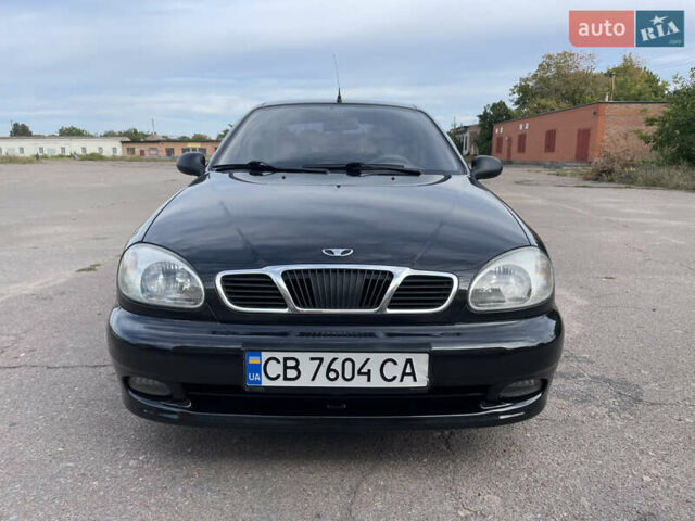 Черный Дэу Ланос, объемом двигателя 1.5 л и пробегом 122 тыс. км за 2950 $, фото 2 на Automoto.ua