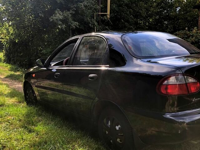 Чорний Деу Ланос, об'ємом двигуна 1.5 л та пробігом 162 тис. км за 2800 $, фото 2 на Automoto.ua