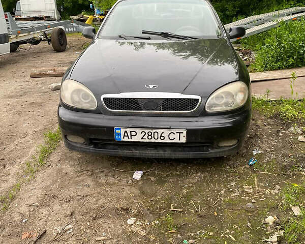 Черный Дэу Ланос, объемом двигателя 0 л и пробегом 250 тыс. км за 2000 $, фото 7 на Automoto.ua