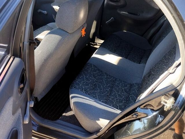 Черный Дэу Ланос, объемом двигателя 1.4 л и пробегом 155 тыс. км за 2199 $, фото 5 на Automoto.ua