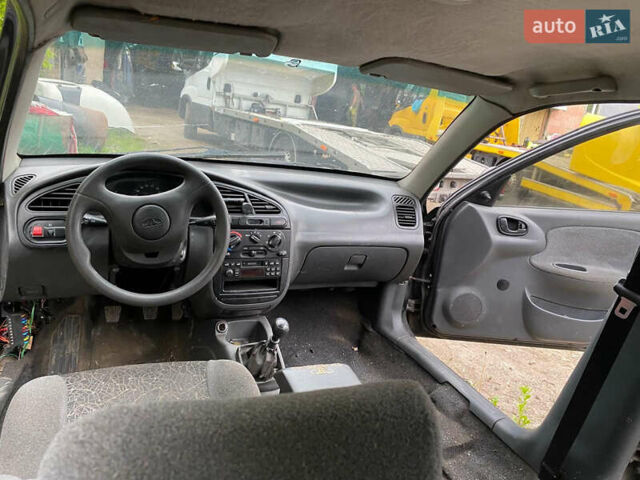 Черный Дэу Ланос, объемом двигателя 0 л и пробегом 250 тыс. км за 2000 $, фото 13 на Automoto.ua