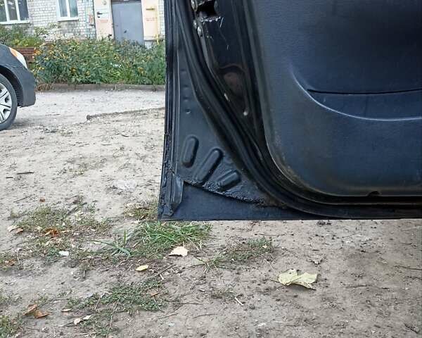 Черный Дэу Ланос, объемом двигателя 1.5 л и пробегом 233 тыс. км за 1600 $, фото 5 на Automoto.ua