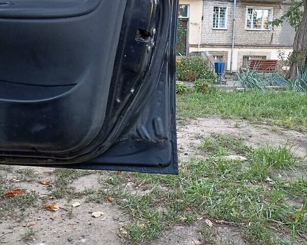 Черный Дэу Ланос, объемом двигателя 1.5 л и пробегом 233 тыс. км за 1600 $, фото 3 на Automoto.ua