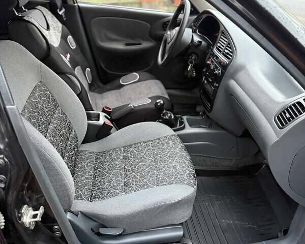 Черный Дэу Ланос, объемом двигателя 1.5 л и пробегом 225 тыс. км за 2999 $, фото 12 на Automoto.ua