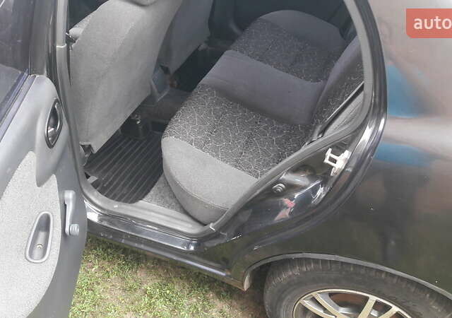 Черный Дэу Ланос, объемом двигателя 1.4 л и пробегом 175 тыс. км за 2500 $, фото 11 на Automoto.ua