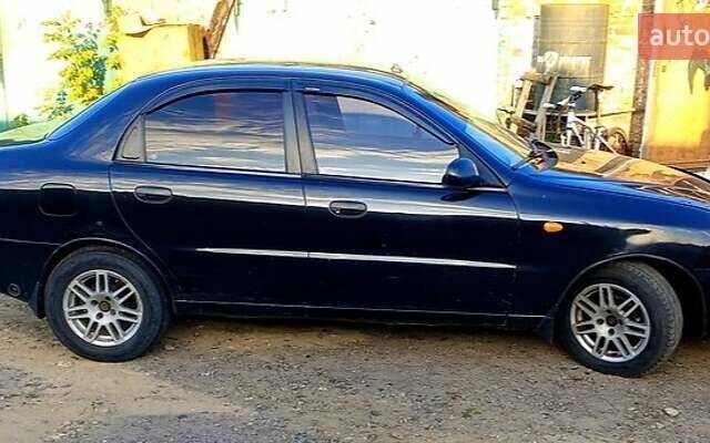 Черный Дэу Ланос, объемом двигателя 1.39 л и пробегом 233 тыс. км за 2200 $, фото 1 на Automoto.ua