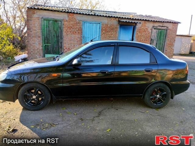 Чорний Деу Ланос, об'ємом двигуна 1.6 л та пробігом 238 тис. км за 2700 $, фото 3 на Automoto.ua