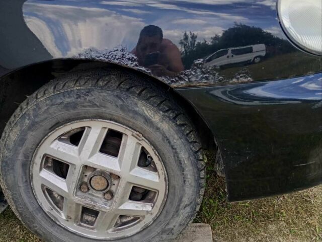 Черный Дэу Ланос, объемом двигателя 1.5 л и пробегом 171 тыс. км за 1600 $, фото 6 на Automoto.ua