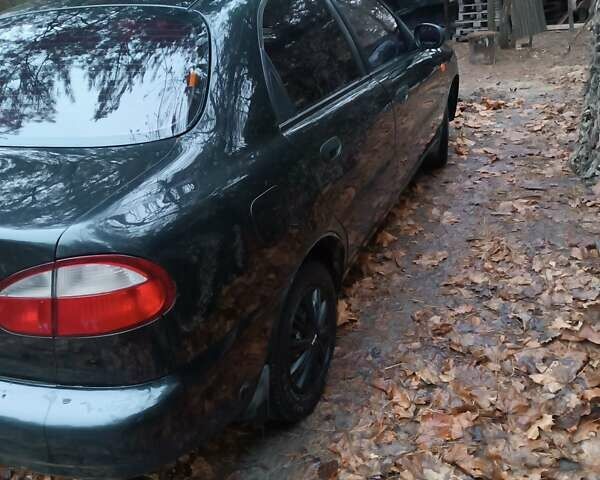 Чорний Деу Ланос, об'ємом двигуна 1.39 л та пробігом 170 тис. км за 2500 $, фото 4 на Automoto.ua