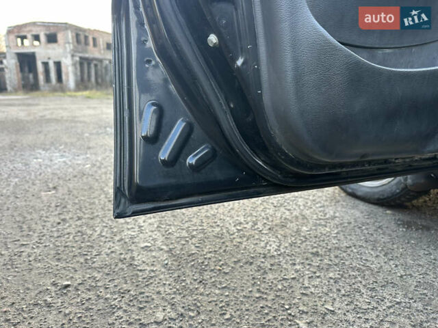 Черный Дэу Ланос, объемом двигателя 1.4 л и пробегом 220 тыс. км за 1450 $, фото 8 на Automoto.ua