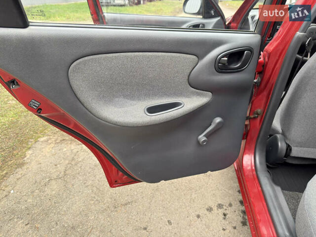 Черный Дэу Ланос, объемом двигателя 1.6 л и пробегом 156 тыс. км за 2400 $, фото 15 на Automoto.ua