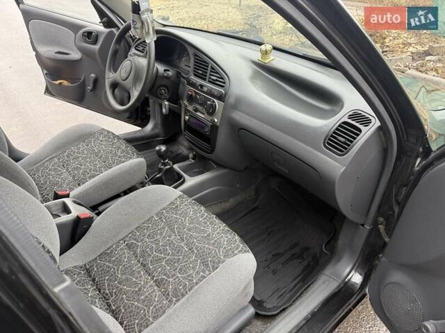 Черный Дэу Ланос, объемом двигателя 1.5 л и пробегом 128 тыс. км за 2999 $, фото 52 на Automoto.ua