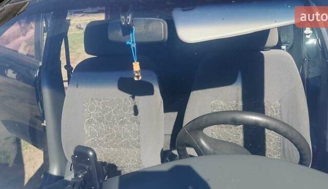 Черный Дэу Ланос, объемом двигателя 1.3 л и пробегом 160 тыс. км за 2000 $, фото 17 на Automoto.ua