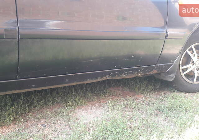 Черный Дэу Ланос, объемом двигателя 1.4 л и пробегом 175 тыс. км за 2500 $, фото 8 на Automoto.ua