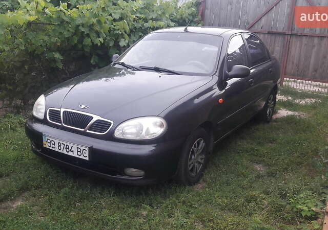 Черный Дэу Ланос, объемом двигателя 1.4 л и пробегом 175 тыс. км за 2500 $, фото 2 на Automoto.ua