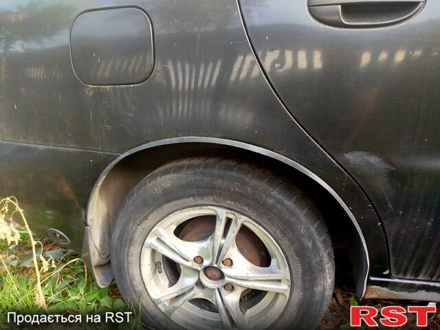 Черный Дэу Ланос, объемом двигателя 1.5 л и пробегом 0 тыс. км за 1950 $, фото 3 на Automoto.ua