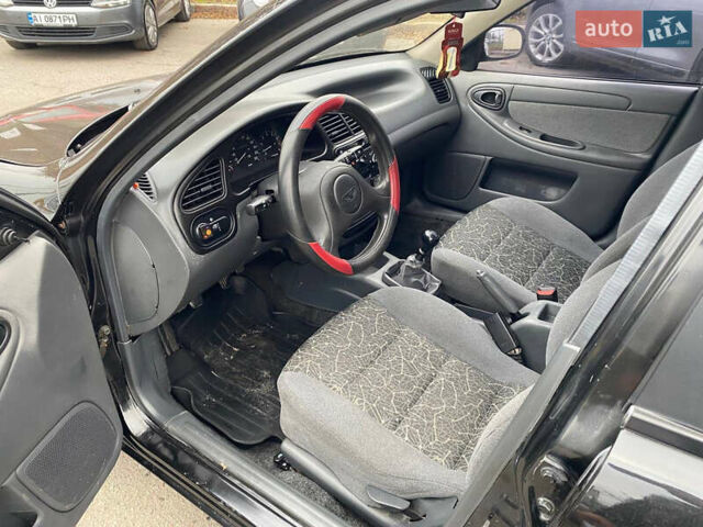 Черный Дэу Ланос, объемом двигателя 1.5 л и пробегом 231 тыс. км за 2900 $, фото 9 на Automoto.ua