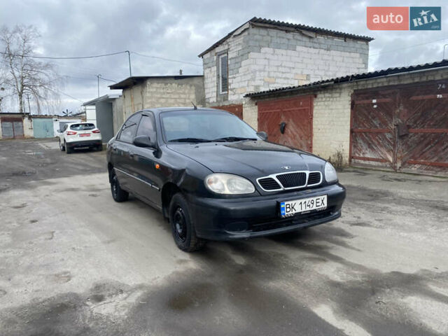Чорний Деу Ланос, об'ємом двигуна 1.4 л та пробігом 180 тис. км за 1800 $, фото 5 на Automoto.ua