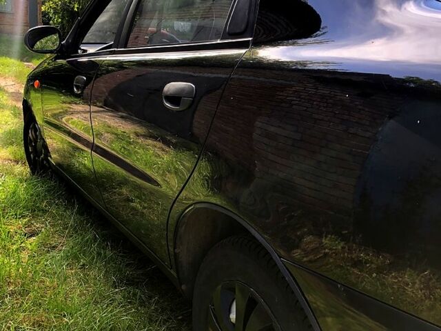 Чорний Деу Ланос, об'ємом двигуна 1.5 л та пробігом 162 тис. км за 2800 $, фото 5 на Automoto.ua