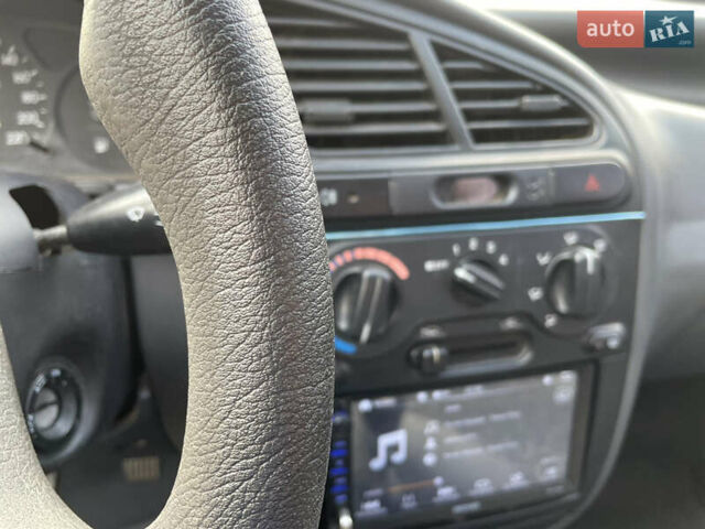 Черный Дэу Ланос, объемом двигателя 1.5 л и пробегом 122 тыс. км за 2950 $, фото 46 на Automoto.ua