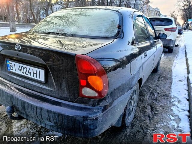 Черный Дэу Ланос, объемом двигателя 1.5 л и пробегом 190 тыс. км за 2550 $, фото 2 на Automoto.ua