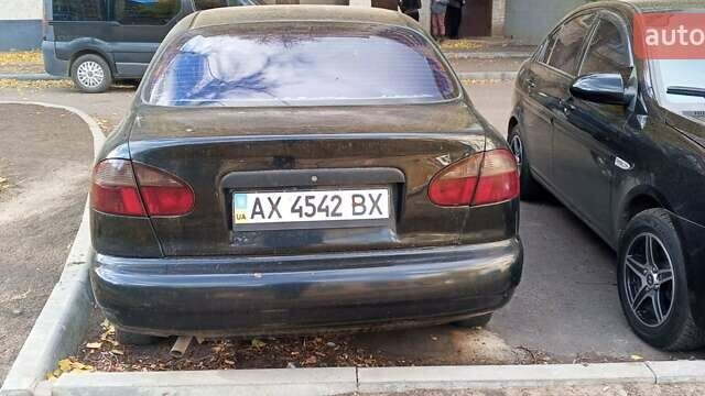 Черный Дэу Ланос, объемом двигателя 1.5 л и пробегом 238 тыс. км за 1950 $, фото 2 на Automoto.ua