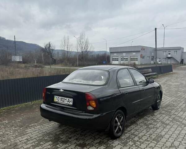 Черный Дэу Ланос, объемом двигателя 1.5 л и пробегом 300 тыс. км за 2200 $, фото 6 на Automoto.ua