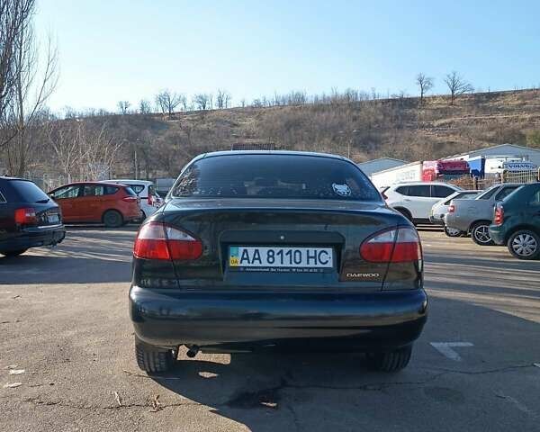 Черный Дэу Ланос, объемом двигателя 1.6 л и пробегом 145 тыс. км за 3200 $, фото 2 на Automoto.ua