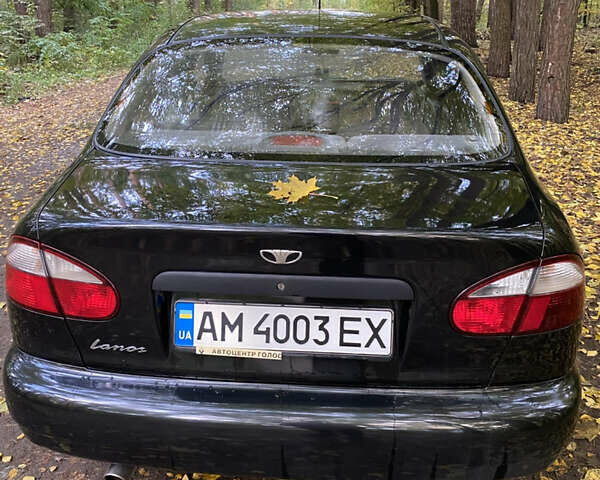 Черный Дэу Ланос, объемом двигателя 1.5 л и пробегом 210 тыс. км за 2700 $, фото 1 на Automoto.ua