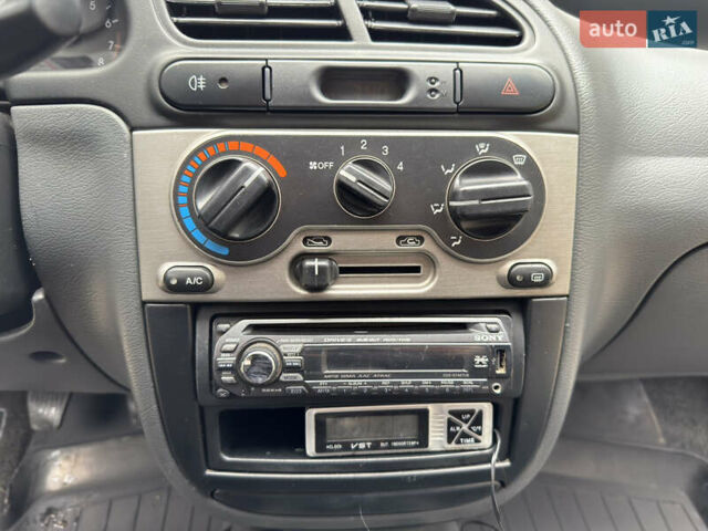 Черный Дэу Ланос, объемом двигателя 1.6 л и пробегом 156 тыс. км за 2400 $, фото 16 на Automoto.ua